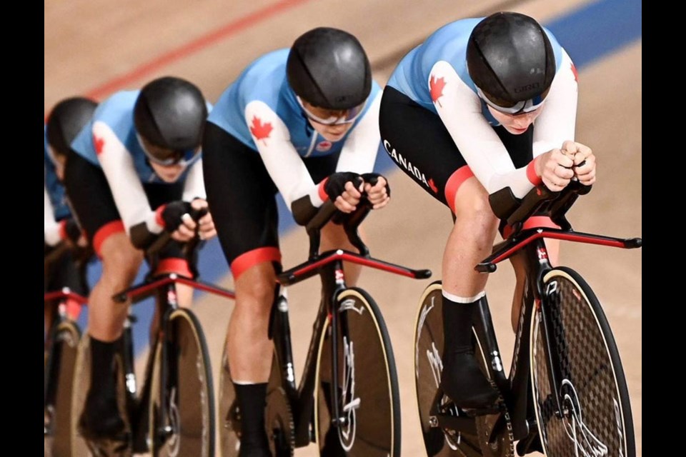 Jasmin Duehring of Coquitlam (left) pedals as hard as she can to stay in sync with her Cycling Canada teammates.