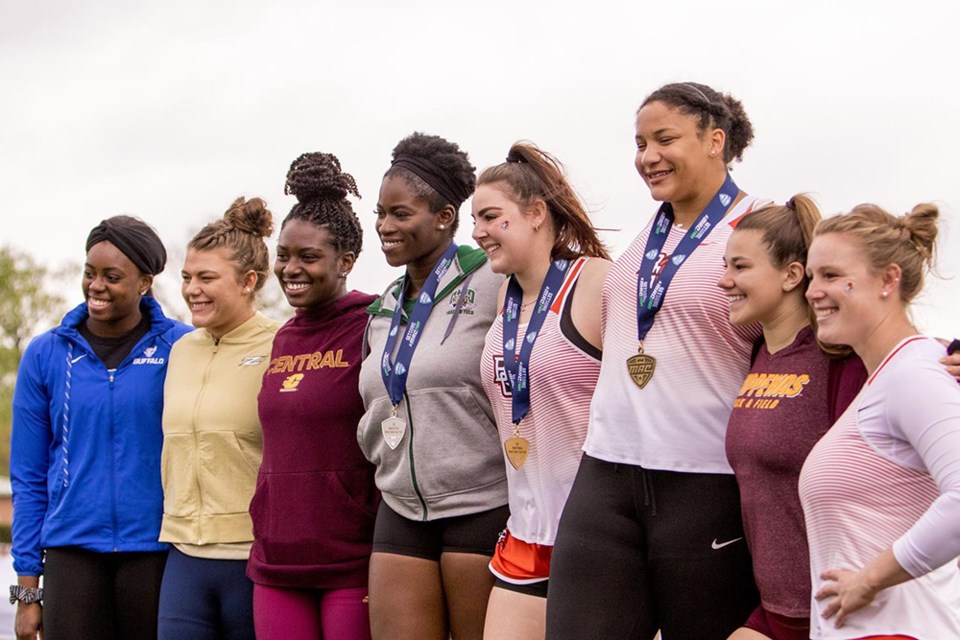 Port Coquitlam's Kaila Butler (4th right) poses for a photo with her conference championship gold medal in NCAA Div. I hammer throw from 2019. She's set to compete for Canada at the 2022 Commonwealth Games.