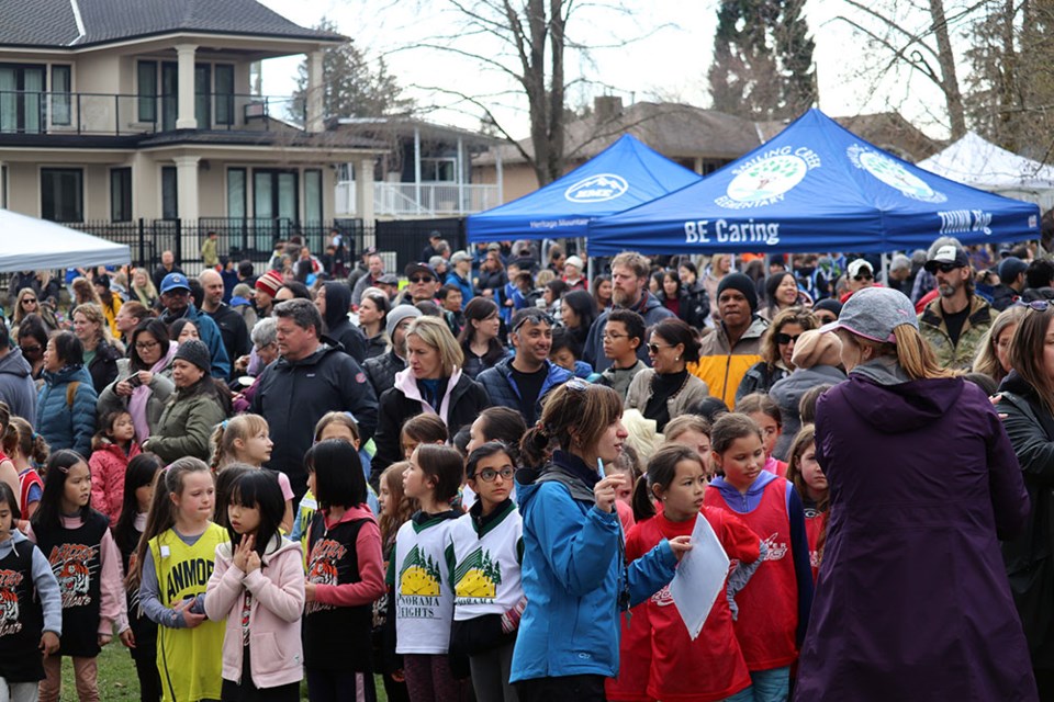 Hundreds of Tri-Cities elementary students await the start of the 2023 Como Lake Relays, which pins School District 43 (SD43) schools against one another in a friendly 1.2-kilometre relay race around Como Lake on April 19, 2023.