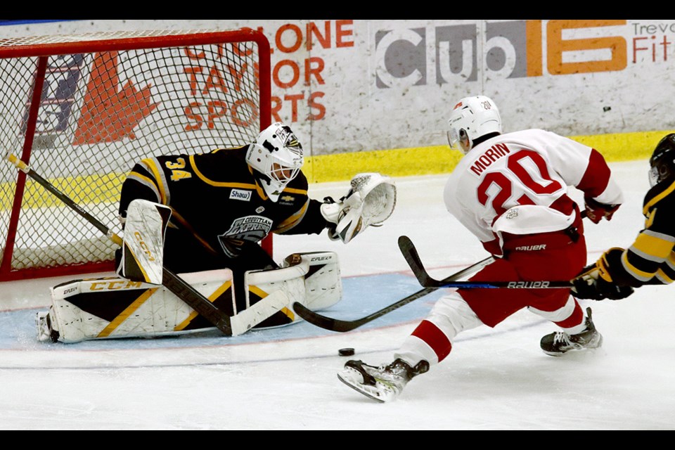Coquitlam Express goalie Adam Manji makes a save on Chilliwack Chiefs forward Nathan Morin in the second period of their BC Hockey League game on Wednesday, Jan. 24, 2024, at the Poirier Sport and Leisure Complex.