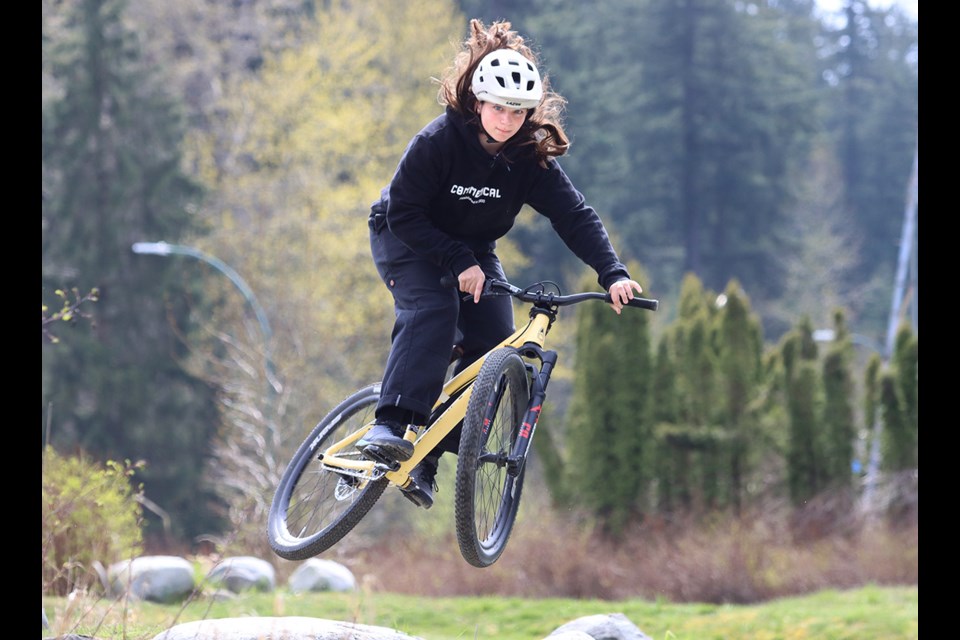 Coquitlam mountain biker Natasha Miller catches some air at the Mundy Park skills park. She recently returned from New Zealand where she placed fourth in the first women's slopestyle competition at Crankwork in Rotorua.