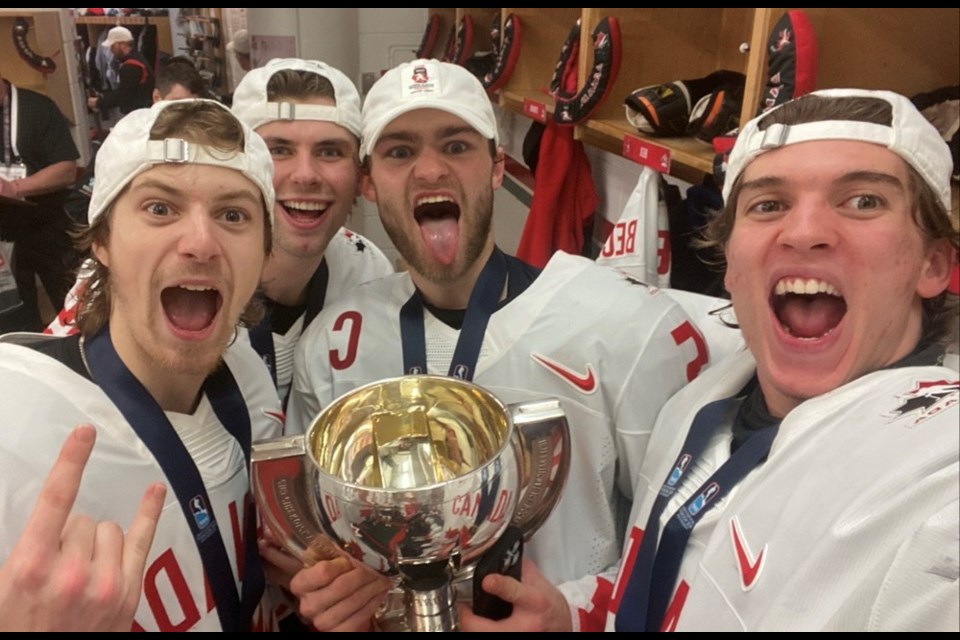 Coquitlam goaltender Thomas Milic (right) takes a selfie with his Canadian teammates, including captain Shane Wright (middle), in celebrating Canada's 20th gold-medal at the 2023 World Junior Hockey Championships in Halifax, N.S.