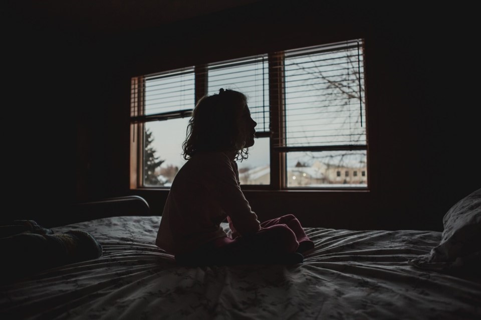 mother-bedroom-window-child-annie-otzen-getty-images