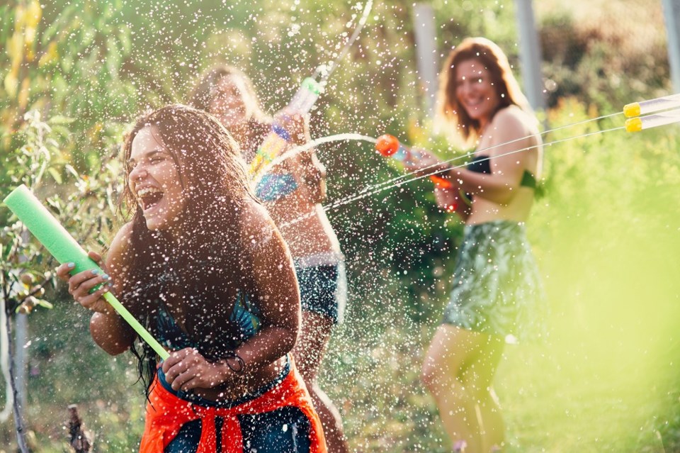 Water gun fight spray party supersoakers - Getty Images
