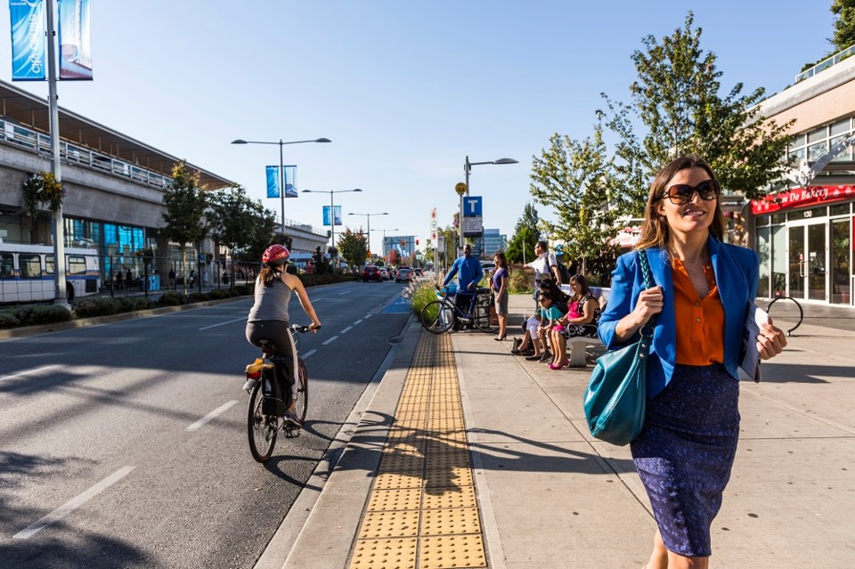 TransLinkCommutersWalkBikeSkyTrainBus2022