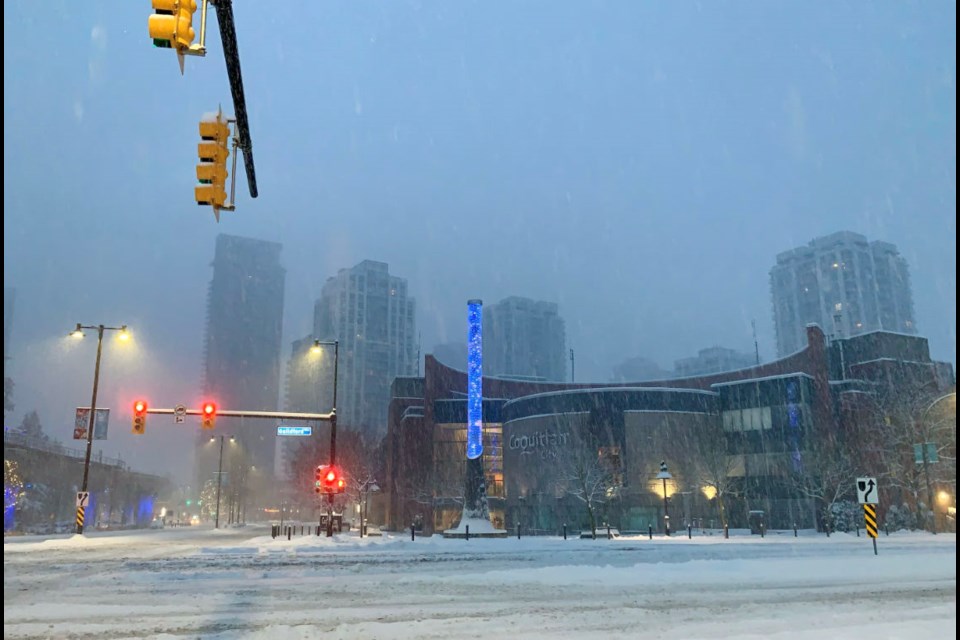 Coquitlam's City Centre is shrouded with snow Wednesday morning.