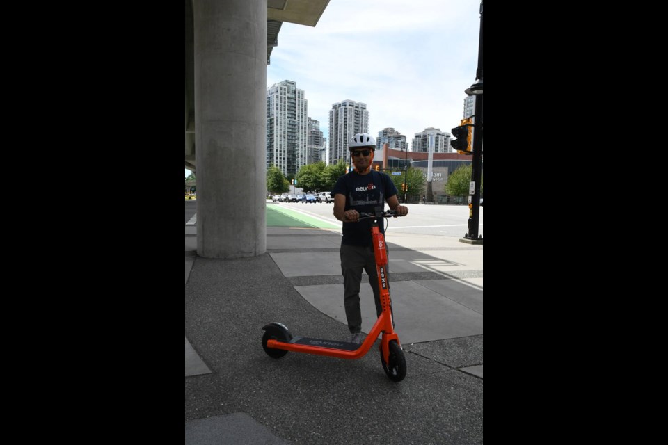 Ankush Karwal, the Canadian marketing head for Neuron Mobility, in Coquitlam on June 29, 2023. | Janis Cleugh, Tri-City News
