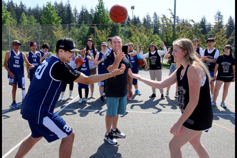 Mike Viveiros, the athletic director at Heritage Woods Secondary School in Port Moody, says a new unified 3-on-3 basketball program could expand to other sports like soccer. The program brought together neuro-diverse and neuro-typical students from six high schools in the school district to play a jamboree schedule of games while learning about things like teamwork. | MARIO BARTEL/TRI-CITY NEWS 