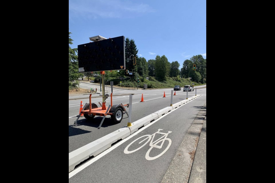 The Guildford Way Greenway and Micromobility Project that started last month separates cyclists and e-scooter riders from vehicular traffic along Guildford Way in the City Centre neighbourhood. TransLink paid for about 60 per cent of the work, about $3 million. | Janis Cleugh, Tri-City News