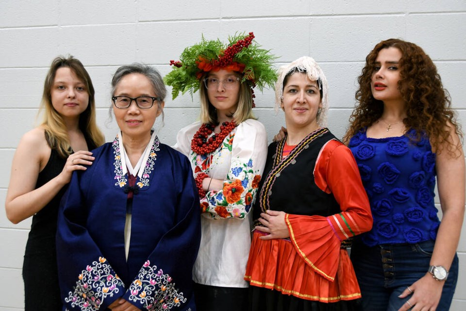 Five of the seven students in Maple Lee’s Welcome to Canada event: Alex Makhavkina (Ukraine); Christina Kim (Korea); Jevgeniya Malezh (Ukraine); Fahimeh Heidari (Iran); and Pani Firouzi (Iran). | Janis Cleugh, Tri-City News