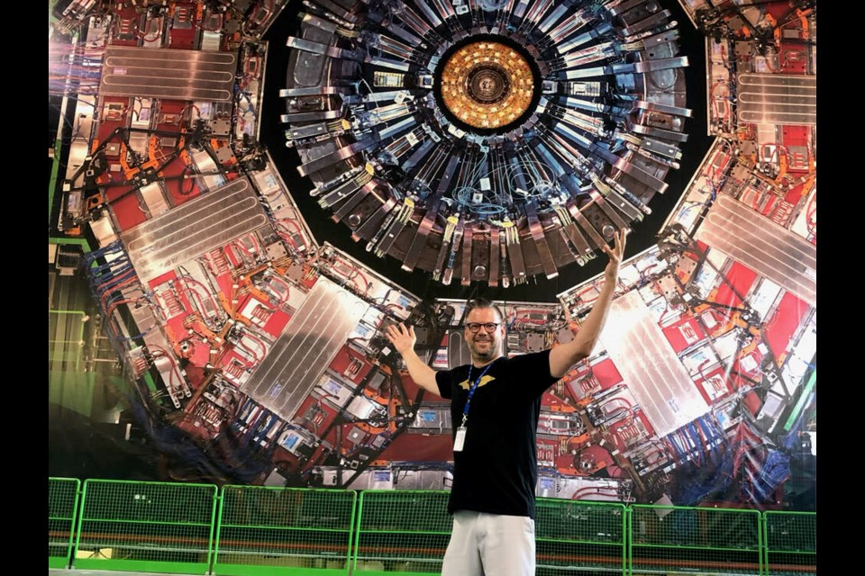 Terry Fox high school teacher Edward Csuka in front of the Compact Muon Solenoid particle physics detector at CERN. | Submitted photo 