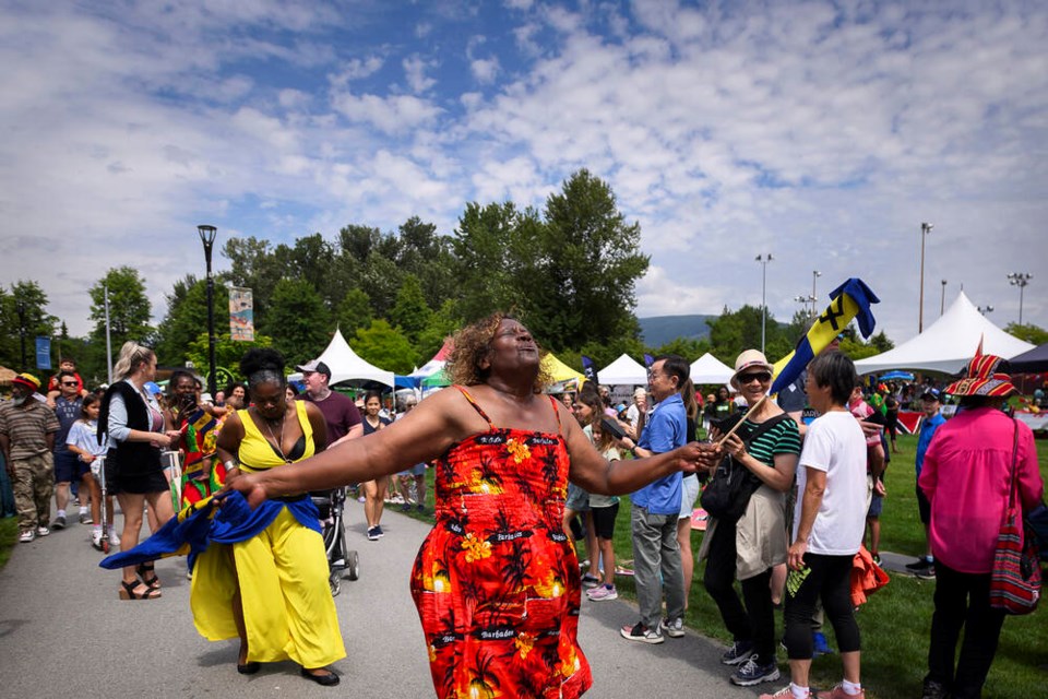 The Festival Parade winds its way through Caribbean Days celebrations last Saturday (July 29) at Coquitlam’s Town Centre Park. | Jennifer Gauthier, Tri-City News