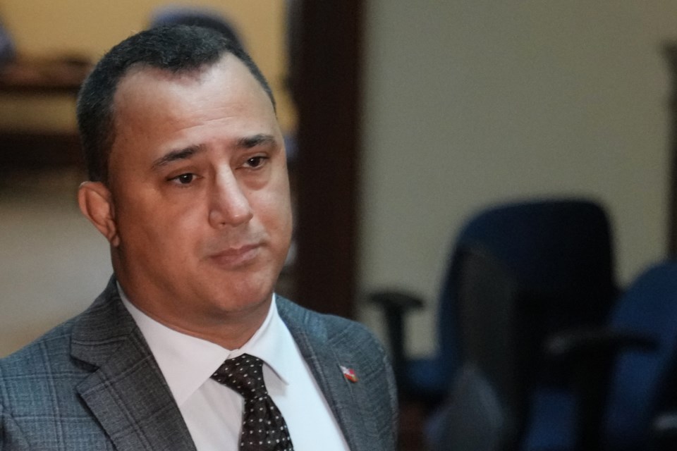 Michael Parsa, Ontario Minister for Children, Community and Social Services, speaks to reporters at the Queen's Park Legislature, in Toronto, Monday, Oct. 16, 2023. 