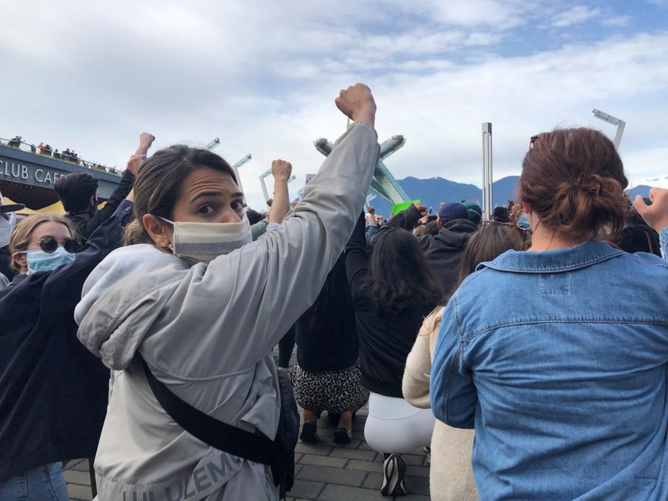 blm protest vancouver crowd takes a knee by elana