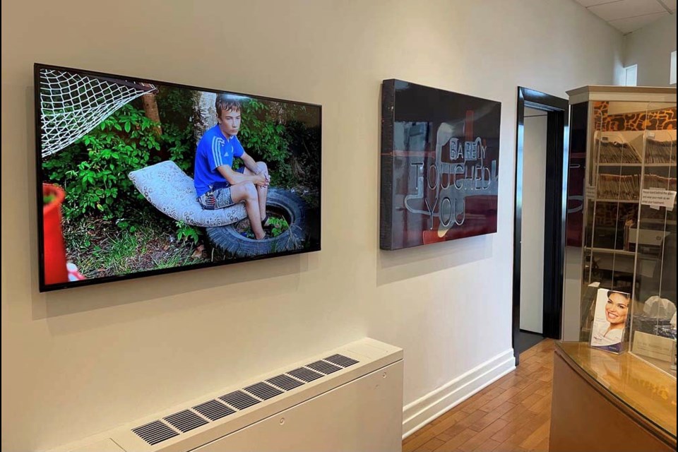 Boy Sitting on a Tire by Adad Hannah and I Barely Touched you by Graham Gilmore will be part of the art show Teeth, Loan and Trust Company, Consolidated: The Trylowsky Collection.