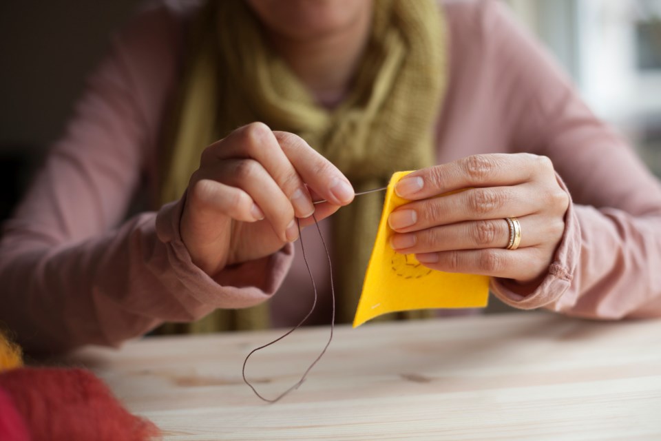 woman sewing