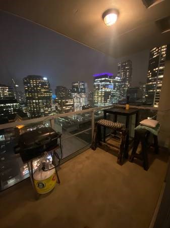The apartment includes a view of the downtown core.