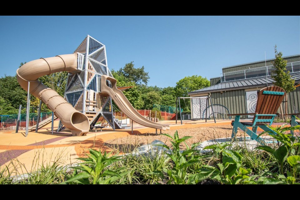 The new 鶹ýӳplayground, opening May 27, now features a play tower, hill slide, in-ground trampoline, net spinner, a water play feature, and plenty of trees for shade. 