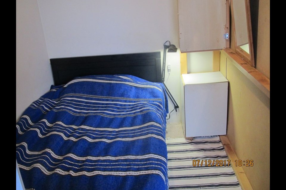 A small den is up for grabs in downtown Vancouver for $1,000 per month with a $10 fee for using bathroom and kitchen supplies. 