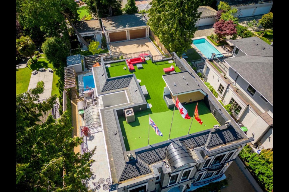 The mansion at 8483 Wilshire St. in Vancouver includes a roof top putting green.