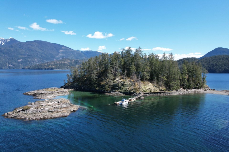 Photos: Price of private B.C. island with unique oceanfront home for sale drops by over a quarter