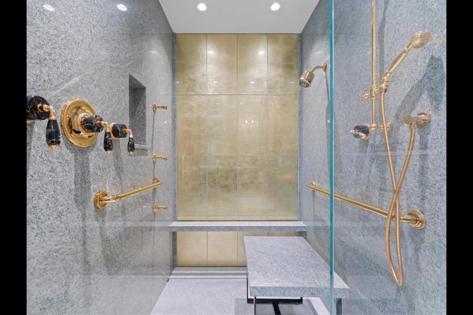 One of the showers has not one but two benches.
