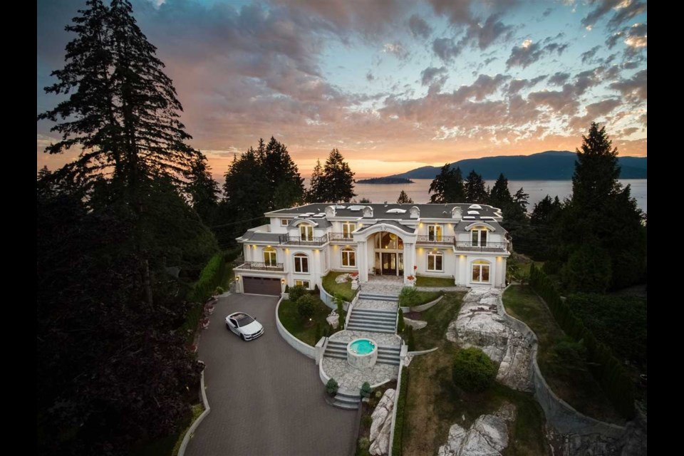 This $22.8 million West Vancouver mansion includes a massive chandelier, outdoor pool with a view and wine cellar.