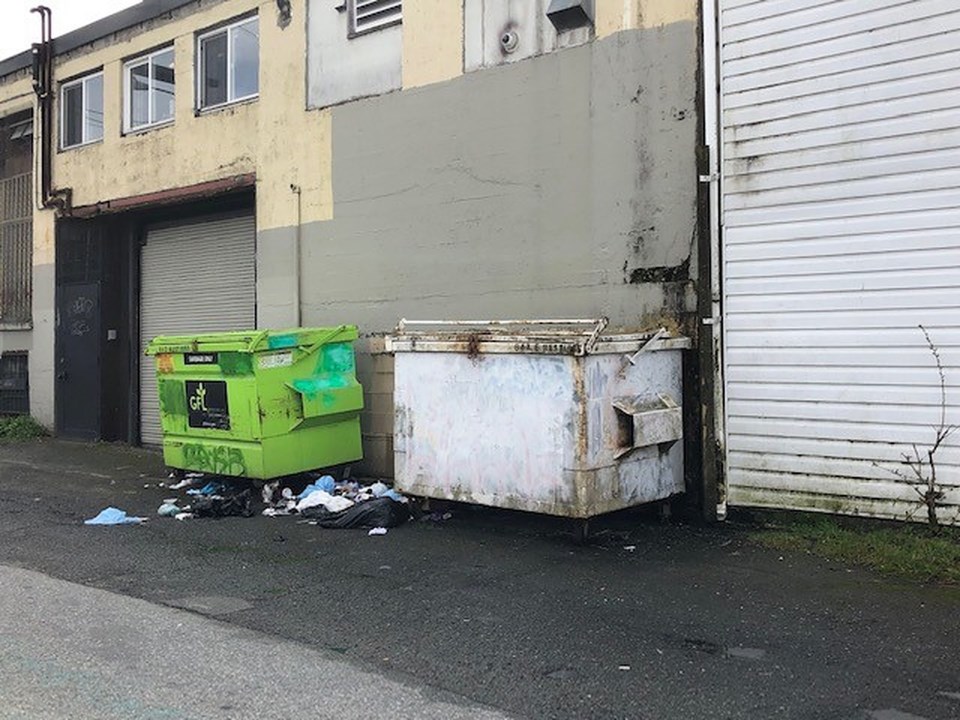 bio-waste illegally dumped by Strathcona, Vancouver business dumpster