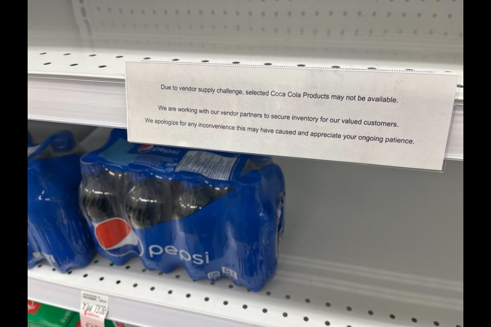 Some shelves at Vancouver grocery stores that normally hold Coca-Cola products are empty.