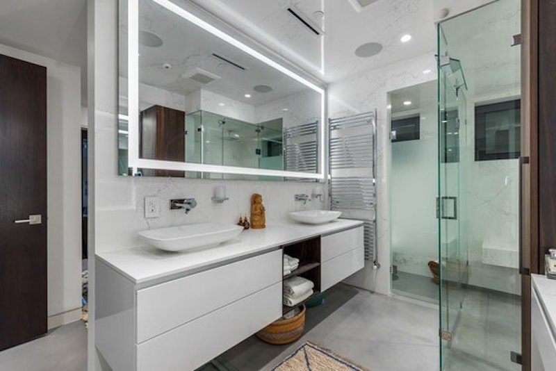 This Vancouver mansion in the Quilchena neighbourhood has rooftop patios and contemporary architecture and is listed on REW for just under $13 million.