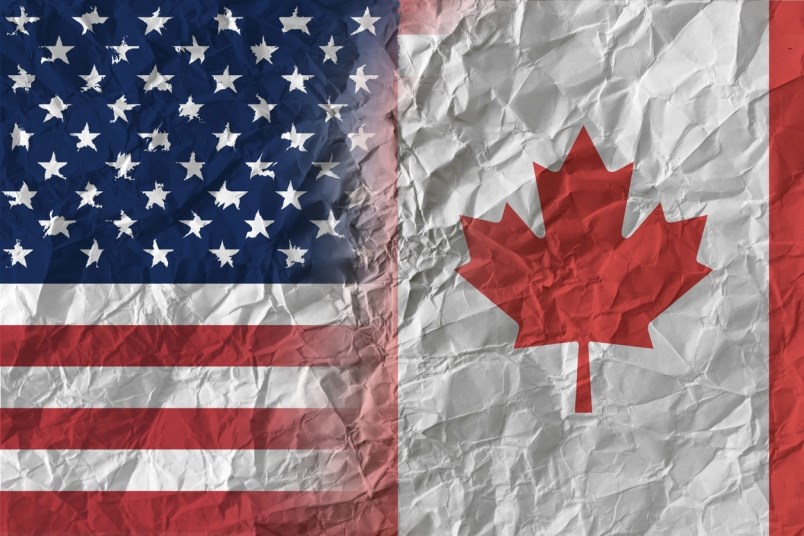 canada-us-flags-darwel-istock