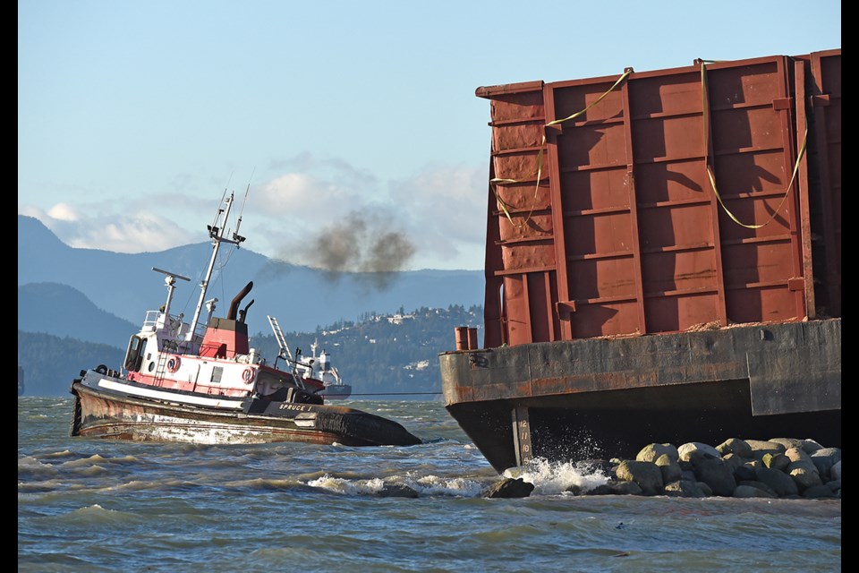 On Nov. 16 a tugboat named the Spruce I was spotted attempting to remove the barge with no success. 