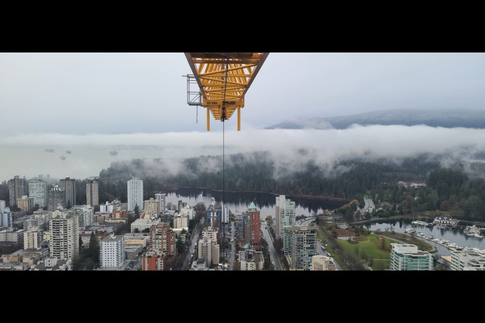 An amateur photographer, Brunette frequently takes snaps from the window of his office in the sky. 