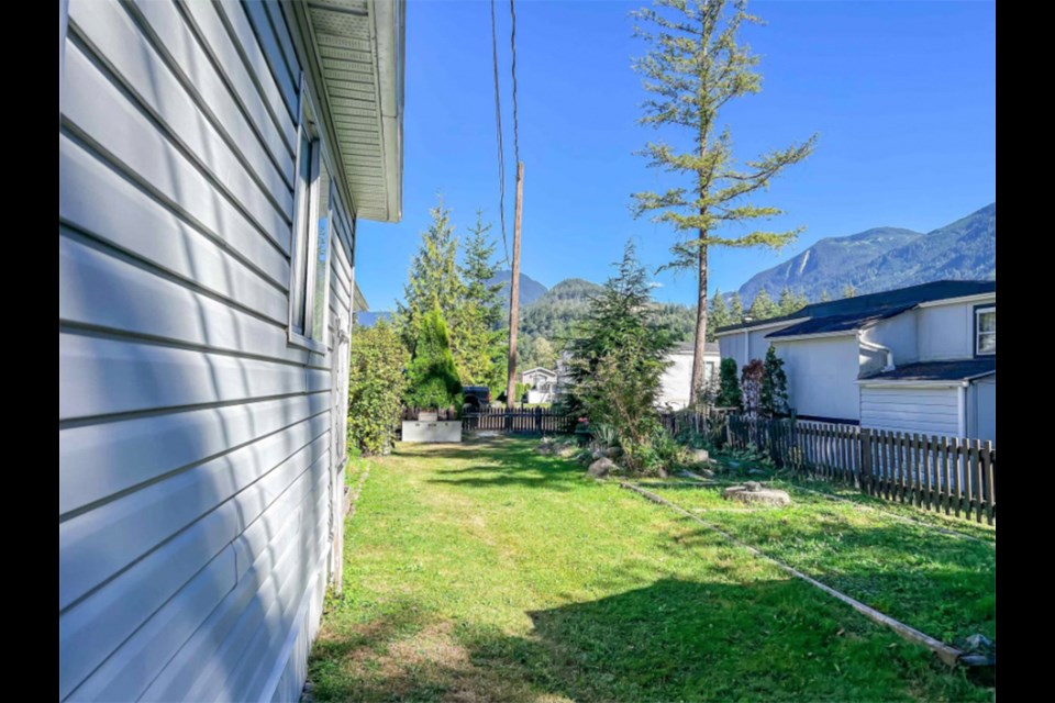 The pad features a fenced-in yard