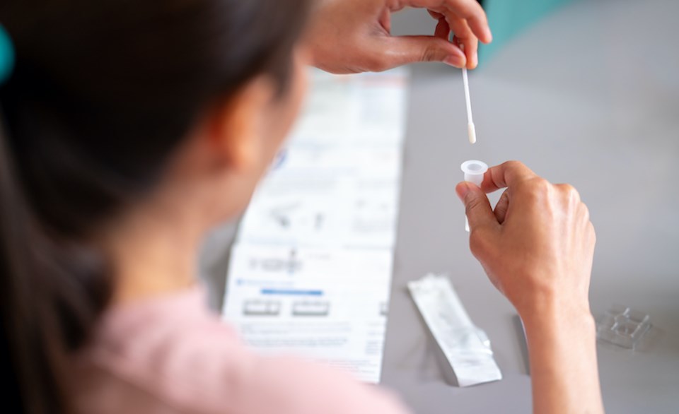 coronavirus-rapid-test-kit-woman