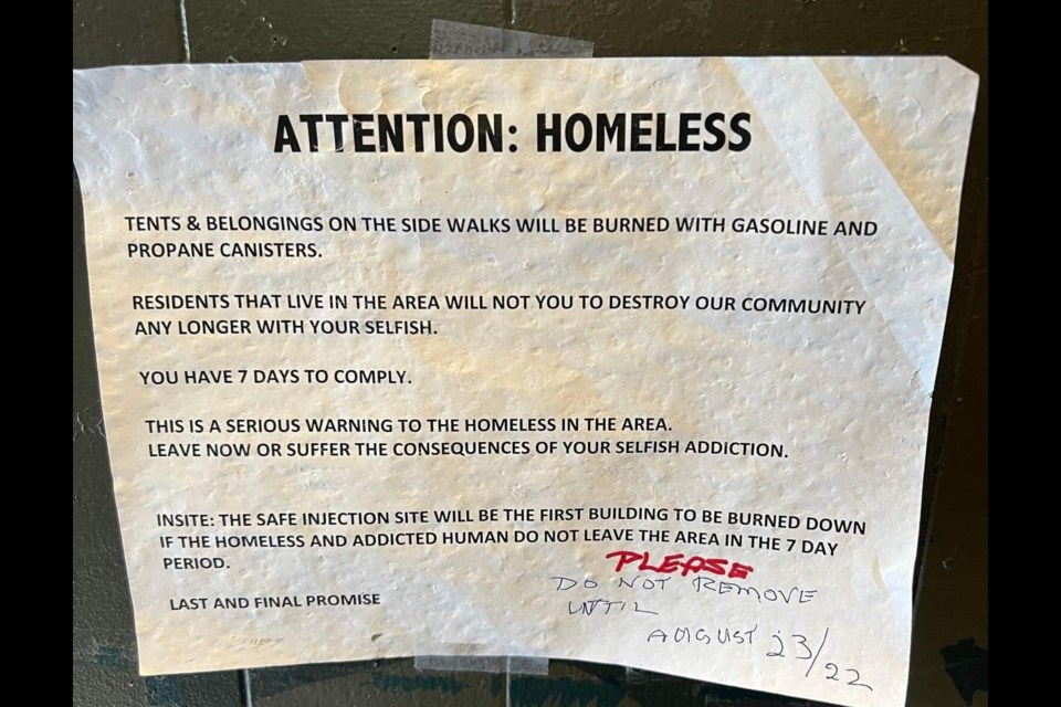 The poster threatens violence and arson if unhoused and homeless people don't leave the Downtown Eastside.