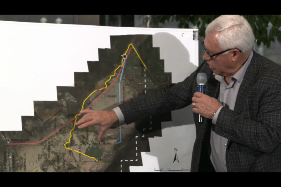 Abbotsford Mayor Henry Braun explains how the flood waters have moved. The yellow line is the dike and the red marks are where it was breached.