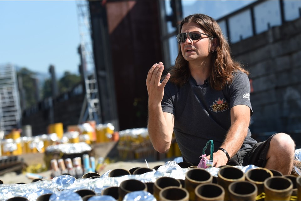 Pyrotechnics expert Kelly Guille describes how a firework shell is launched aboard the barge that powers Vancouver's Celebration of Light fireworks. 