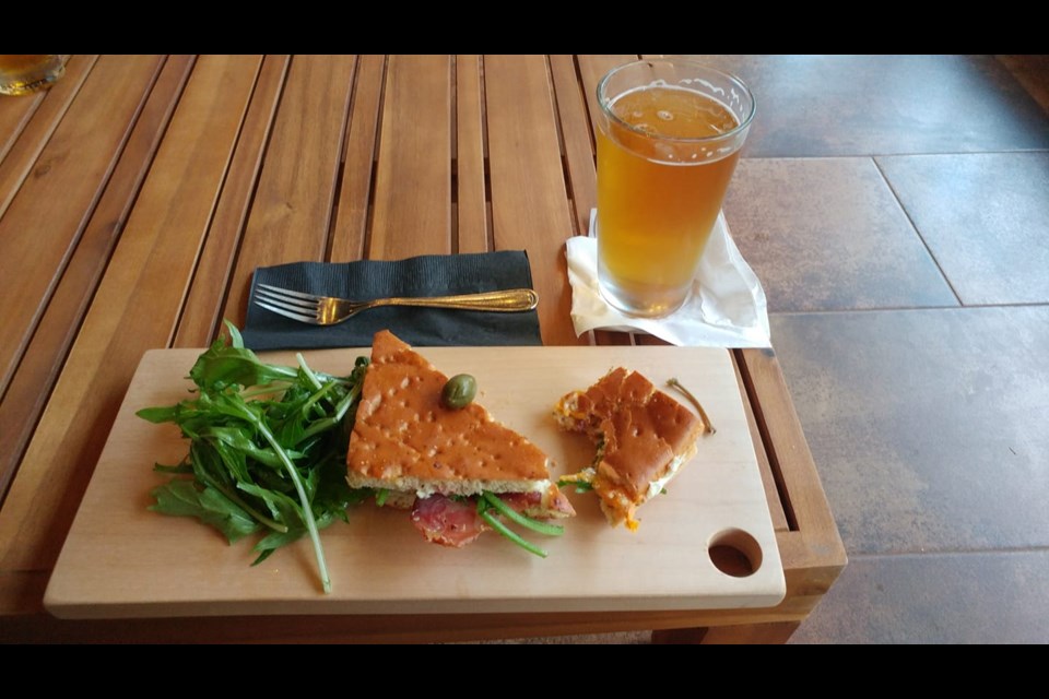 The Cure, with salami, cheese, and local greens. Blind Rabbit/Facebook