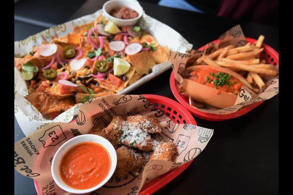 Courtside, which just opened up on Main Street, features a menu of elevated arena-inspired eats like hot dogs and nachos