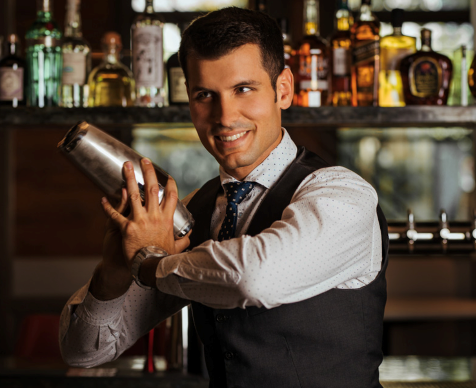 Bar manager Nico Tognon shakes up Italian-inspired cocktails at the new Tutto Restaurant and Bar in Yaletown-Vancouver