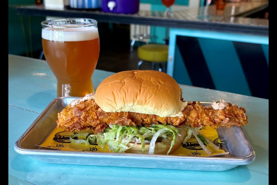 Kapow!, a 鶹ýӳfood truck with smashburgers and tots, has put a massive fried fish burger on the menu for summer 2024.