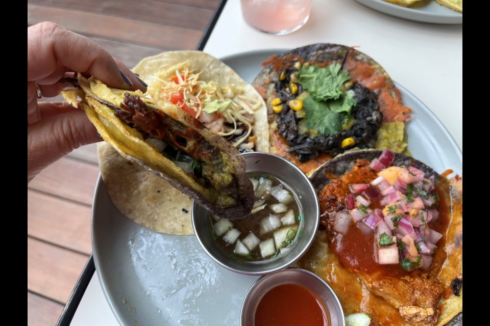 La Taqueria is best known for its tacos, including their birria - slow-cooked meat - that comes with a broth for dipping.