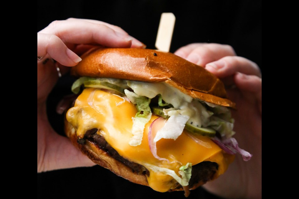 During Le Burger Week 2023, burger lovers can find 17 special burger creations across Metro Vancouver to try, including The Deluxe from Mahony's Tavern
