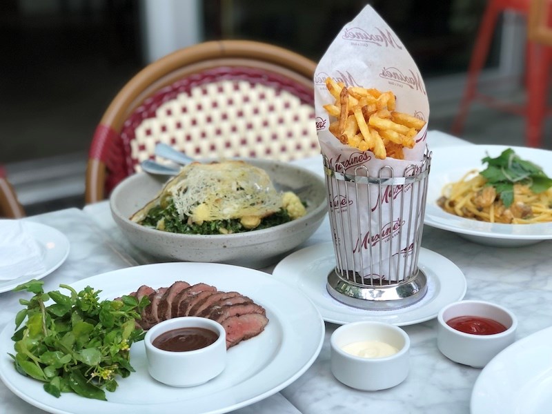 maxines-steak-frites-dishes-table