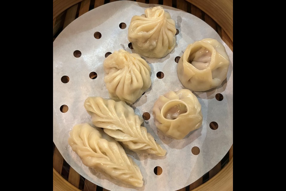 Momos are dumplings in the Nepalese tradition, which is rooted in Indo-Chinese cuisine