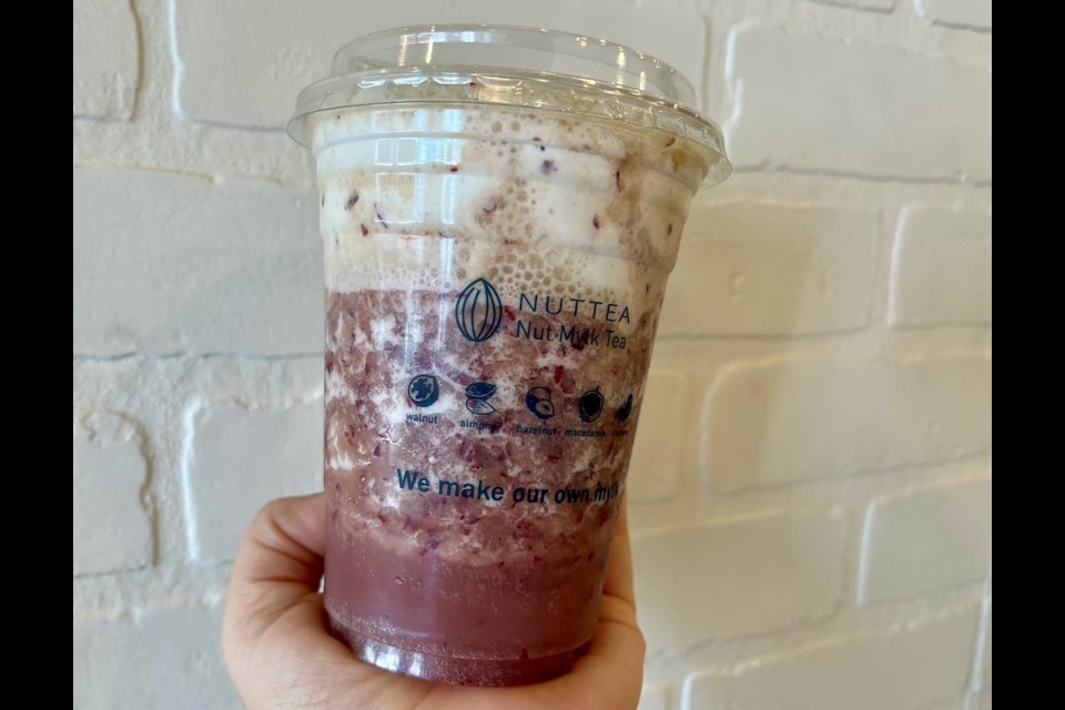 A red grape tea with nut cream topping is one of the drinks you can get at Nuttea in Vancouver.