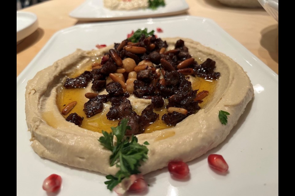 Qube, which opened in early September in the former Trattoria spot on West 4th in Kitsilano, is a new Vancouver restaurant specializing in Lebanese fare, including dishes like this Beiruty Hummus, topped with kawarma - lamb morsels.
