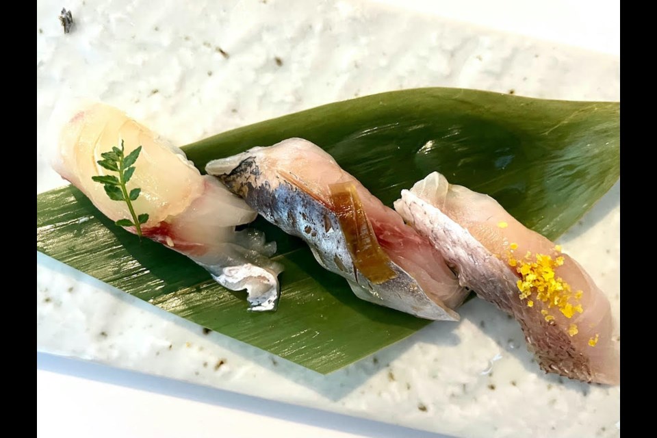 The lunch omakase includes several pieces of nigiri