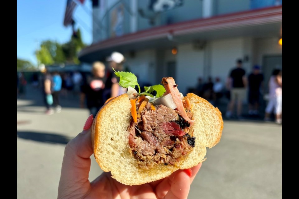 The banh mi is one of Rosie's BBQ new menu offerings for summer 2024. The Texas-style smoked meats trailer parks outside Nat Bailey Stadium on game day Saturdays for Vancouver Canadians home games